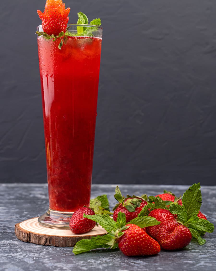 Fresh strawberry juice in a tall glass