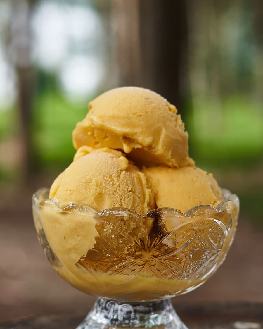 Scoops of ice cream in a glass bowl