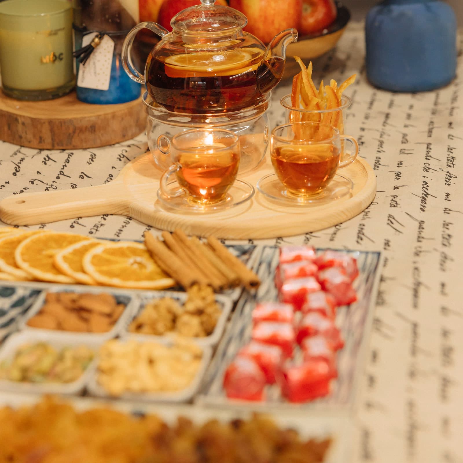 Tea glasses with a tray of dried fruit